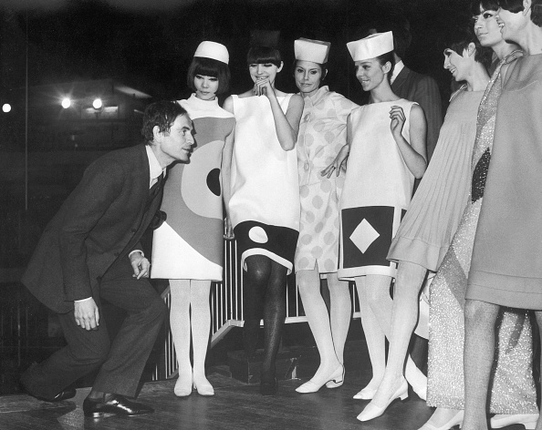 Pierre Cardin was photographed alongside models dressed in graphic round-neck shift dresses from his Spring/Summer 1966 “Target” collection, one of which Jenna Ortega later wore to the 21st Rome Film Festival (Festa del Cinema di Roma).